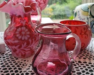 Collection of cranberry glass, not all pieces shown