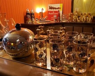 MCM vintage penguin ice bucket and  black & gold barware glasses
