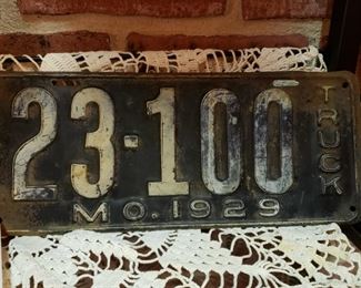 Collection of vintage license plates, not all shown including Missouri 1966, January 1961, 1931 Missouri and this Truck MO 1929