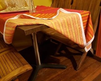 Formica top pedestal tables x 2 and eight wooden folding chairs