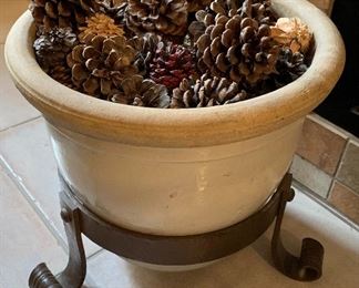 Pottery in Iron Stand w Pine Cones for Fireplace