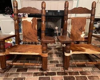 Pair of Signed Cowhide Rockers by R. E. Dedeaux Clan