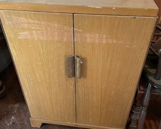 . . . love this retro cabinet housing an early TV
