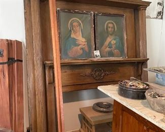 . . . two religious icons and an early 1900's oak fireplace surround