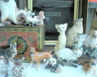 Just a small sampling of Cat and Dog figurine collection....ceramic, glass, pottery, brass & wood