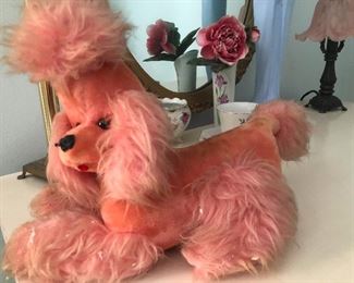 this is my poodle from when I was 4 years old not the EXACT one but I had one just like this!!!