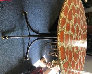 cool vintage table with a composite sparkly top bar height