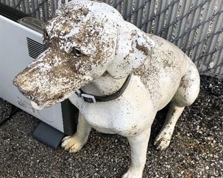 Cement life-size dog statue