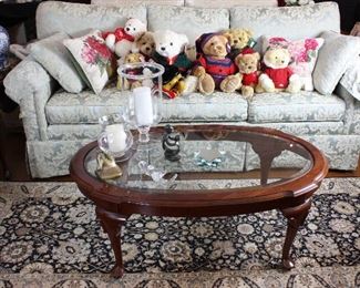 Sofa, cherry coffee table, Harrod's bears