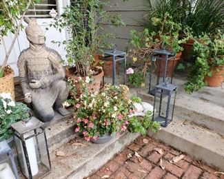 Plants, planters, statuary, outdoor lighting