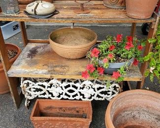 Potting bench, plants, planters, wrought iron plant stands