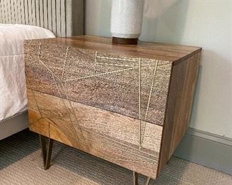 Roar & Rabbit™  for West Elm Geo Inlay Nightstand 2 available  The mango wood used on this product is sustainably sourced from trees that no longer produce fruit  .Overall: 24"w x 18"d x 24"h.
Solis Wood finish is natural with brass inlay
2 drawers open on smooth metal glides.