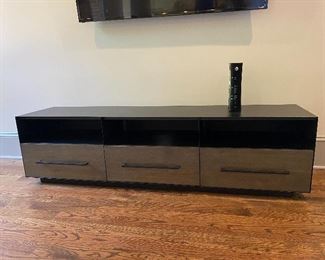 West Elm Massarro Media Console  68"w x 16"d x 20"h.
Oak veneer over solid wood drawers in an Umber finish.
Metal case and hardware in a Hot-Rolled Steel finish