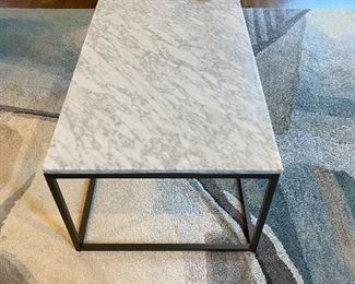  West Elm Carrara Marble Box Frame Coffee Table', airy base and sleek marble top adds instant glam to your living room.
Carrara marble top.. Antique Bronze-finished steel 