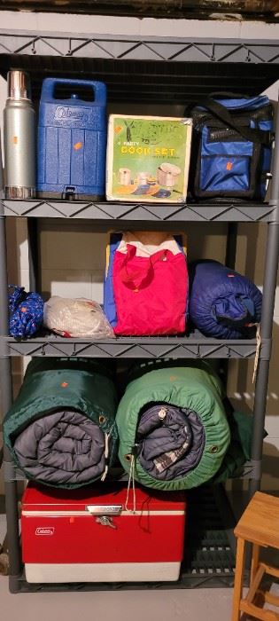Sleeping bags, camping gear, red coleman cooler