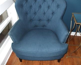  2 navy blue sitting chairs
