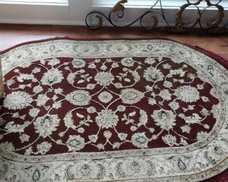 Oval red rug