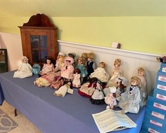 Madame Alexander dolls, antique hanging cupboard