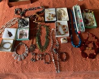 Case Table 
Jewelry various artists
Kissing Dog Designs, People’s Pottery, Cazenovia Jewelers, costume, sterling, precious stone