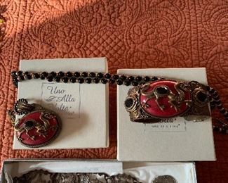 Case Table 
Una Alla Volta dragon set(not pictured are the matching earrings) 
Ornate bracelet made in Spain 