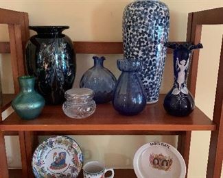 Living Room 
Blown glass, cut glass items, Tiffany & Co. baby set, Queen Elizabeth baby set