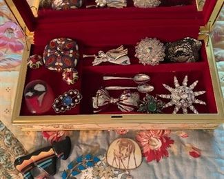 Case Table 
Sterling, Enamel, & rhinestone pins