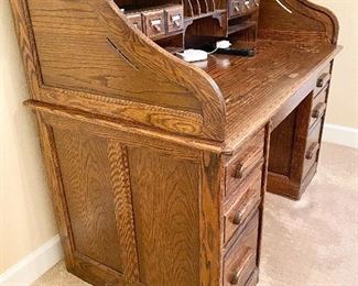 Additional photo of side view of roll top desk