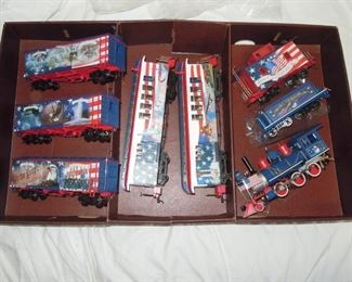 $100 obo -Hawthorne Village On30 lcocmotive with tender, caboose, three freight cars and two passenger cars look new. Engine runs well, light works. runs on HO track