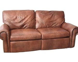 9. Rolled Arm Leather Loveseat With Studded Details By LEATHER CREATIONS