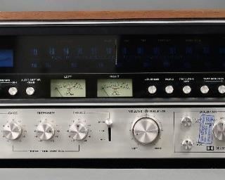 Vintage Sansui 9090DB Stereo Receiver The Sansui 9090DB offers advanced technology in a stereo AM/FM receiver. It features a 125wpc power amplifier section, direct readout power meters, an AM/FM analogue tuner, Dolby noise reduction circuit, Bass, Midrange and Treble controls (defeatable), two tape loops and a Moving Magnet Phono stage. With a classic 1970s wood covering. The receiver is in very good vintage condition and includes the original manual. Dimensions: 7.25" x 21.25" x 15.75".