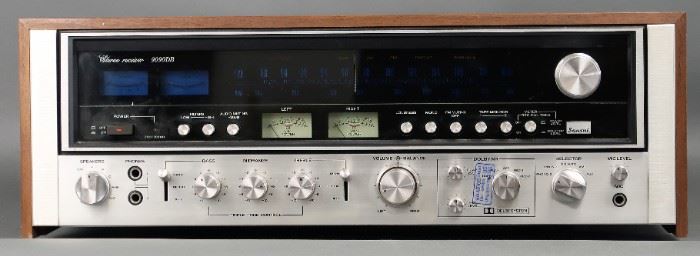 Vintage Sansui 9090DB Stereo Receiver The Sansui 9090DB offers advanced technology in a stereo AM/FM receiver. It features a 125wpc power amplifier section, direct readout power meters, an AM/FM analogue tuner, Dolby noise reduction circuit, Bass, Midrange and Treble controls (defeatable), two tape loops and a Moving Magnet Phono stage. With a classic 1970s wood covering. The receiver is in very good vintage condition and includes the original manual. Dimensions: 7.25" x 21.25" x 15.75".