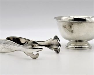 Sterling Paul Revere Bowl & Silverplate Tongs • STERLING SILVER Paul Revere Reproduction Bowl. The classic style of this Revere Bowl dates back to American colonial times, when Boston patriot Paul Revere first created this piece. Since then, it has become a tradition in both sporting circles and in home décor. Whether engraved for a winning trophy or as a gift for the bride and groom, this polished pewter bowl will surely become a treasured heirloom. 3.75"dia. x 2.25"H - 76.17g

• Kirk Stieff SMITHSONIAN Institution Tongs 1992 Silverplate Made in Italy 6" - 61.75g