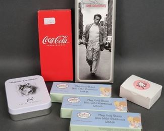 NOS Avon Disney & More Collectors Watches 7 new in box, old stock Avon brand various collectors watches, some have tins and a pair of Hello Kitty hoop earrings.
James Dean, Hello Kitty (hoop earrings), Wolf pocket watch in tin, Coke & Precious Moments watches.