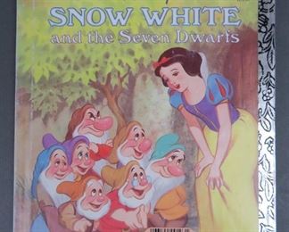 Rare ERROR Walt Disney Little Golden Book 1990's very unique and rare item from a Little Golden Book Walt Disney series. Not only is the Snow White and the Seven Dwarfs front cover upside down, but the book inside is Donald Duck's Toy Sailboat!!! The book is in very good condition.