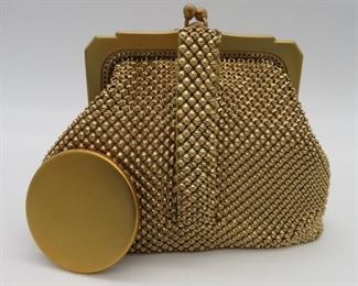 Vintage WHITING & DAVIS CO. gold metal mesh kiss lock coin purse pouch with a 1.75" matching tone mirror.