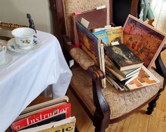 Carved Eastlake arm chair, author/illustrator signed books, vintage magazines