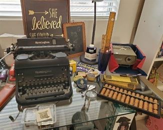 Antique Remington typewriter, Viewmaster projector (we have tons of Viewmaster reels), vintage abacus, old typewriter ribbon tins, vintage office items (rulers, inkwells, etc (not all pictured)