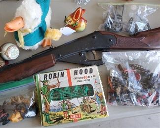 Vintage toys: Duncan spin top, Lehman tin bunny, lead toy soldiers, plastic animals, Robin Hood play men, Model 75 Daisy bb gun, bag of 29 vintage Micro Machine cars.