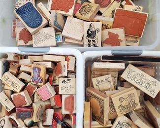 Bins of rubber stamps. The 2 bins on the bottom are at least 8" deep, hundreds of stamps.