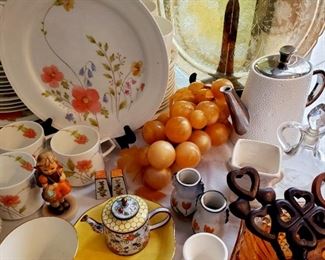 MCM lucite peach colored grapes, vintage pottery, depression glass, Welsh wedding spoons (lower right)