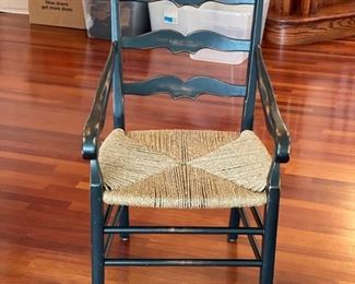 Set of 6 cane-seat ladderback chairs with a distressed ebony finish.