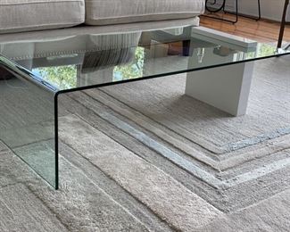 Buono high glass white lacquer coffee table with waterfall edge. Measures 50" W x 27" D x 14.5" H. Photo 2 of 2.