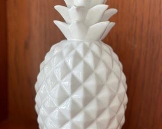 White decorative pineapple. Measures 13" H.