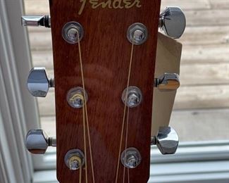 Fender acoustic guitar with stand. Photo 3 of 3.