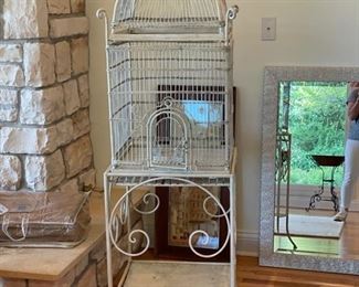 Vintage metal birdcage. Measures 65" H x 17" x 17".