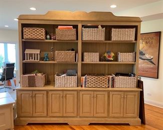 Freestanding grand bookcase used as a basement room divider. Measures 102" W x 19" D x 93" H.