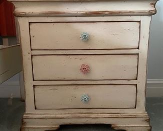 Woodland side table with floral drawer pulls. Measures 30" W x 20" D x 30" H.