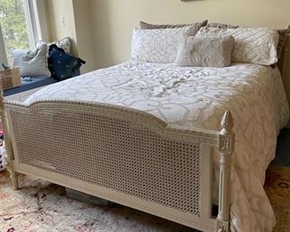Queen whitewashed cane bed frame. Bedding and mattress set sold separately. Photo 1 of 3.