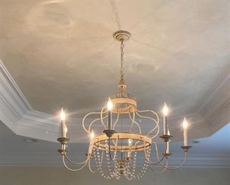 Metal and crystal "crown" 8-arm chandelier. Measures 30" H x 36" W.