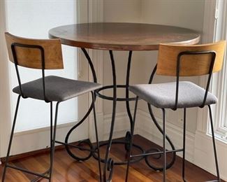 Stamped Copper Top Bistro Table with Wrought Iron Pedestal. Measures 42" D x 41" H. Photo 1 of 2.